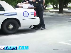 busty brown-haired cops satiate a black stud
