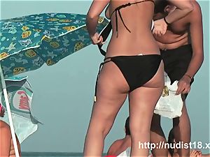 naked beach voyeur vid of torrid playful nudists in water